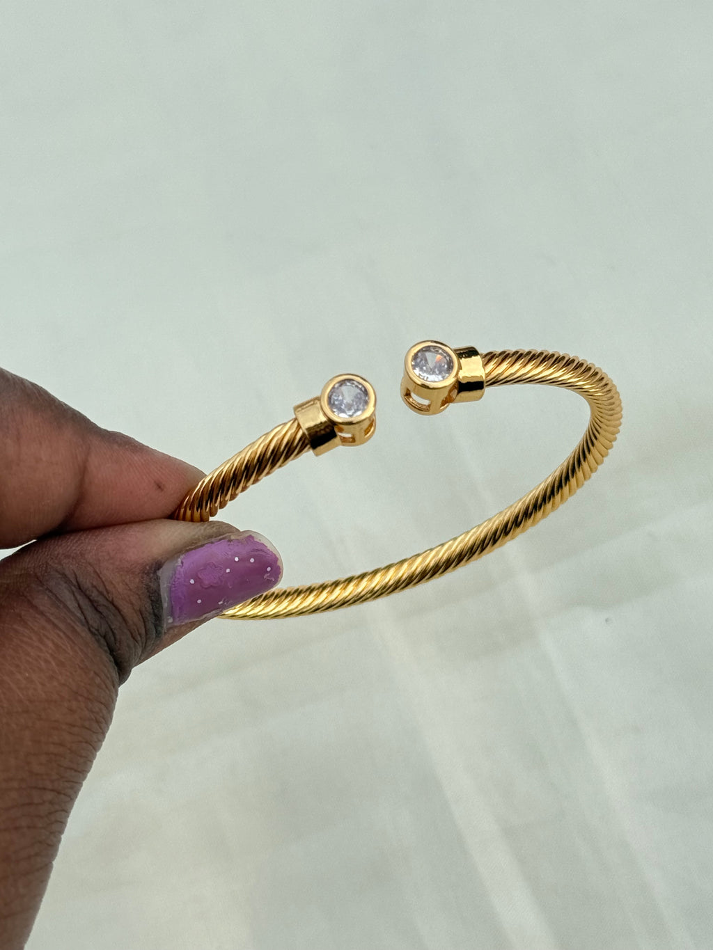 Ab008 white stone twist anti tarnish bracelet