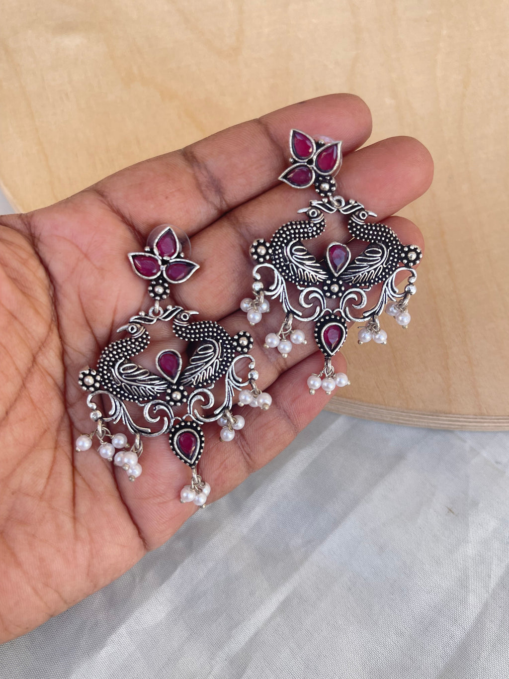 Lightweight chandbali oxidised earrings in ruby and green