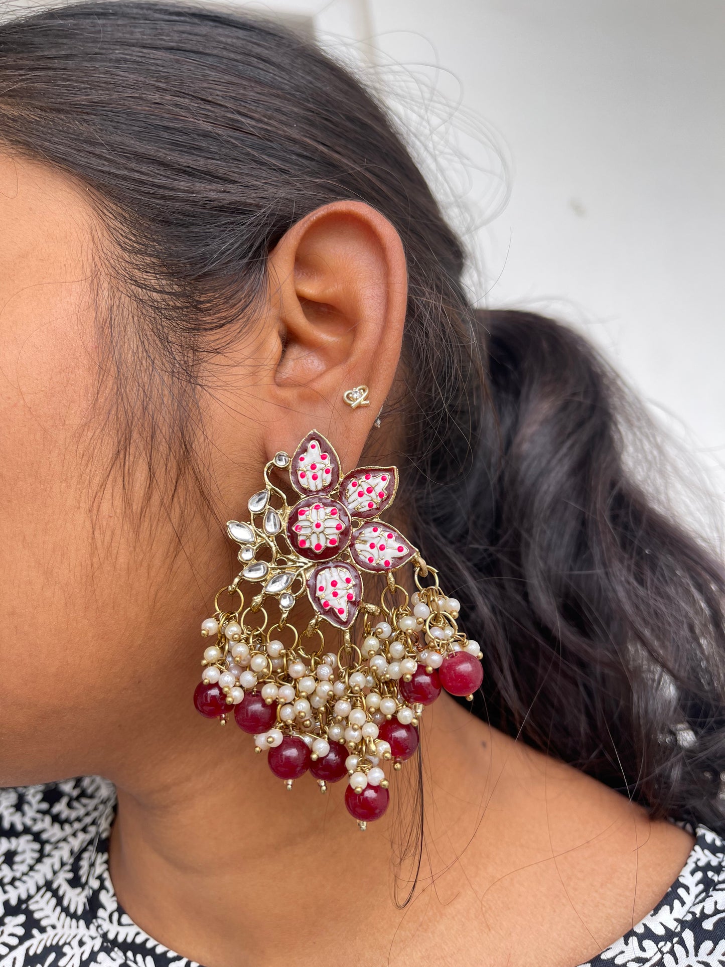 Half lotus earrings with beads hanging