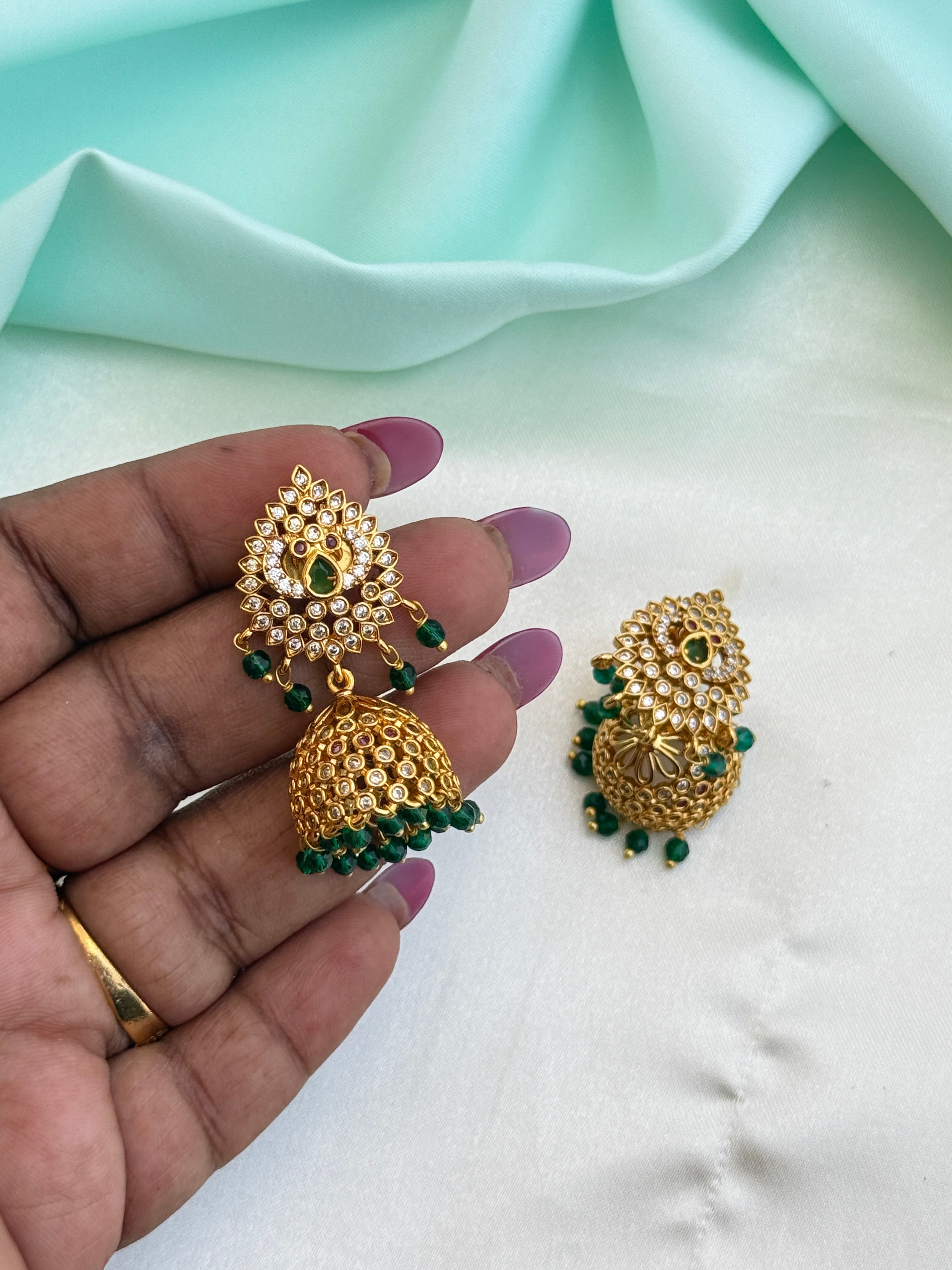 Er250 dual peacock butta earrings