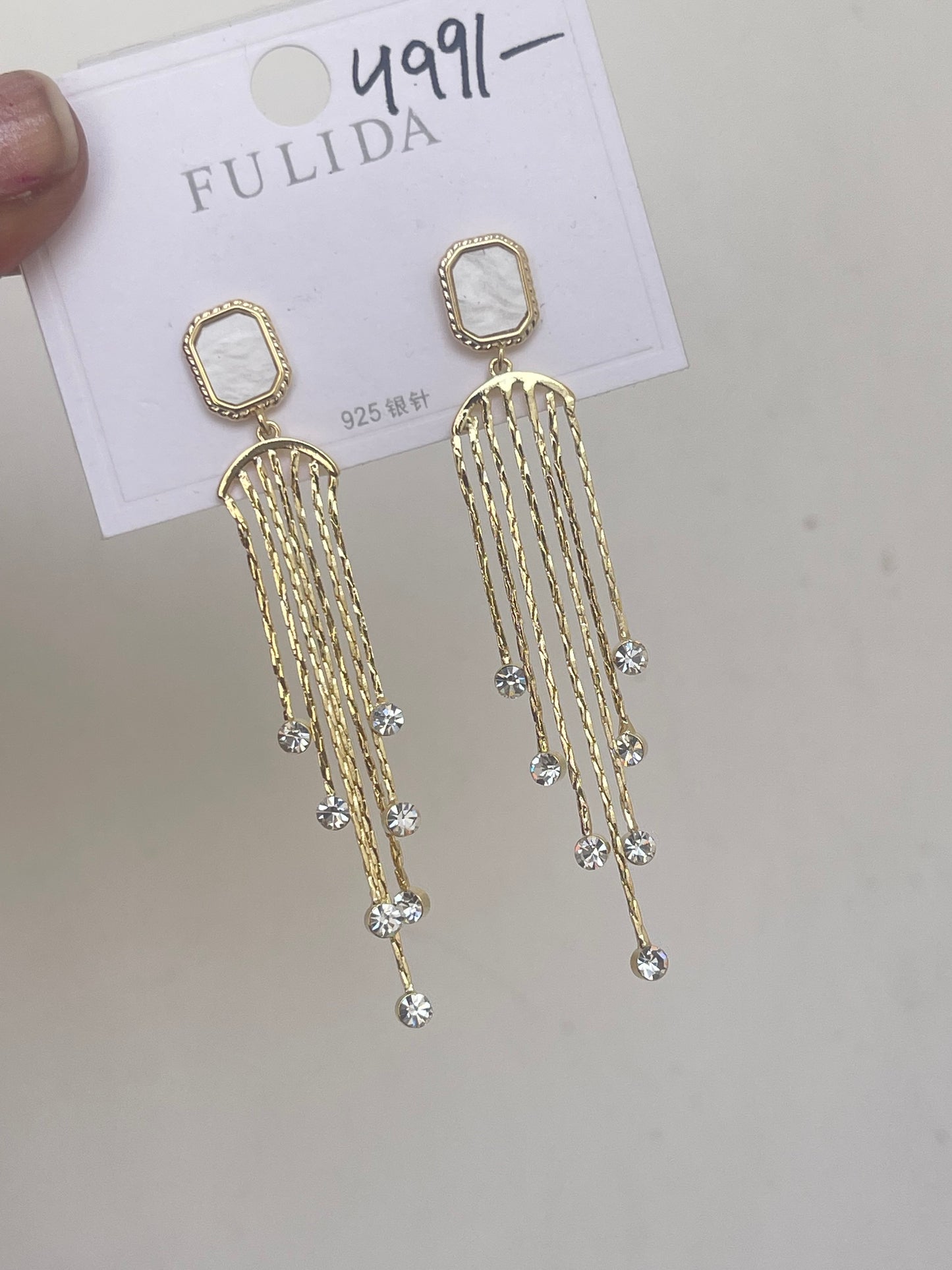 Square hanging tassels in gold and rosegold