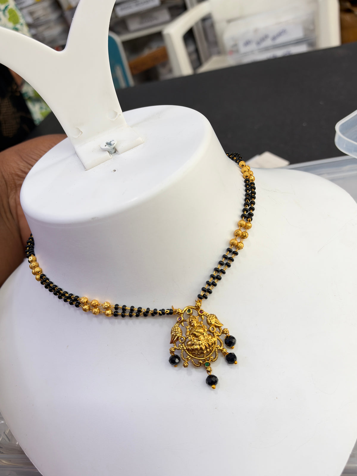 Bb446 lakshmidevi pendant with parrot 2 lines 18 inches black beads