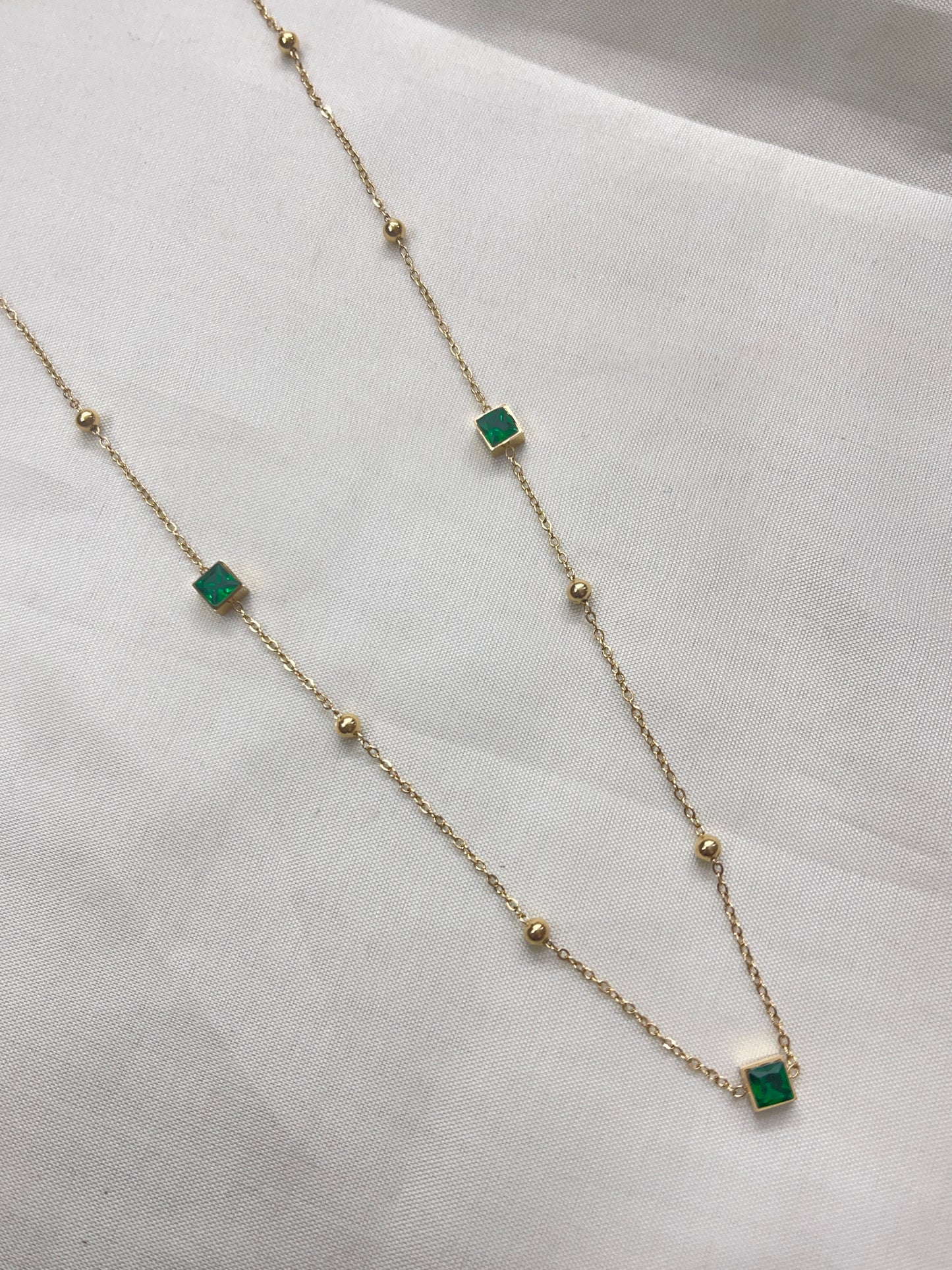 Green square stone neckline