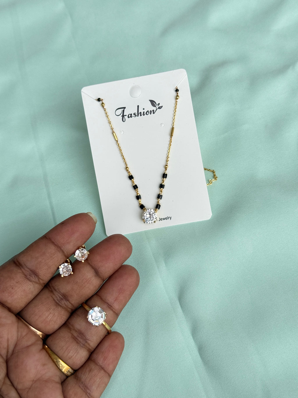 Cb002 (U will get one chain, 1pair studs ,1 finger ring)