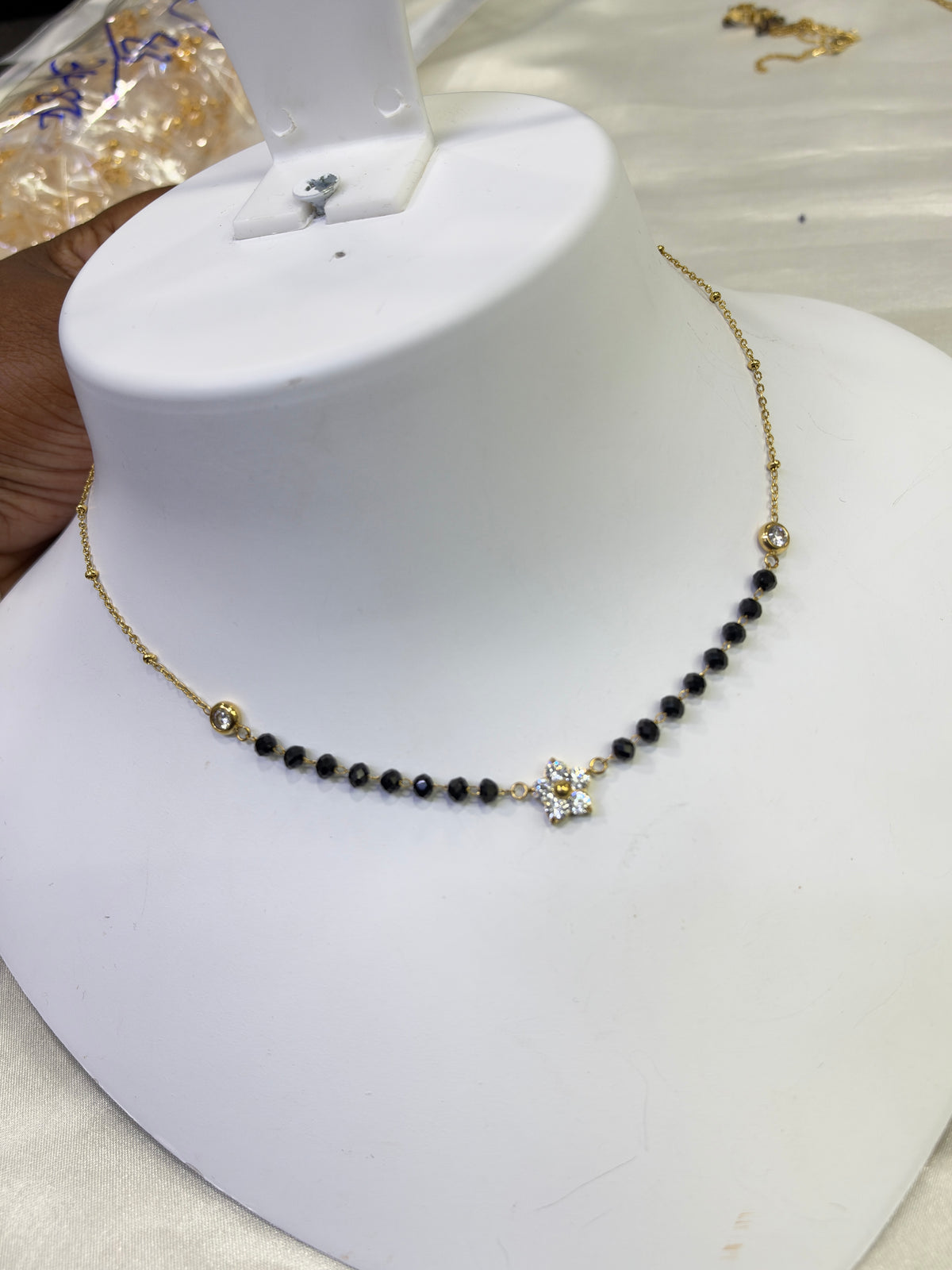 Bb473 anti tarnish single flower 16 to 18 inches adjustable black beads