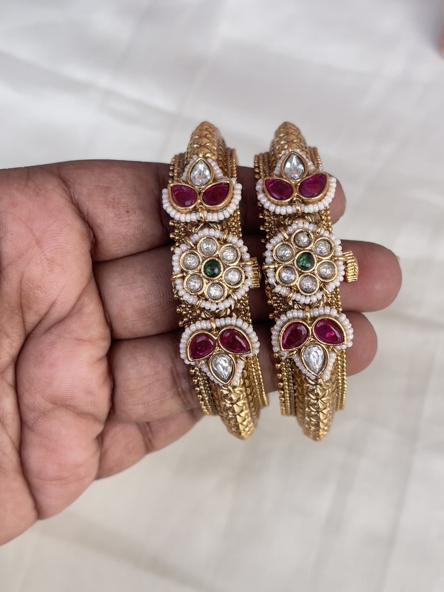 Pair of jadau kundan stone openable bangle