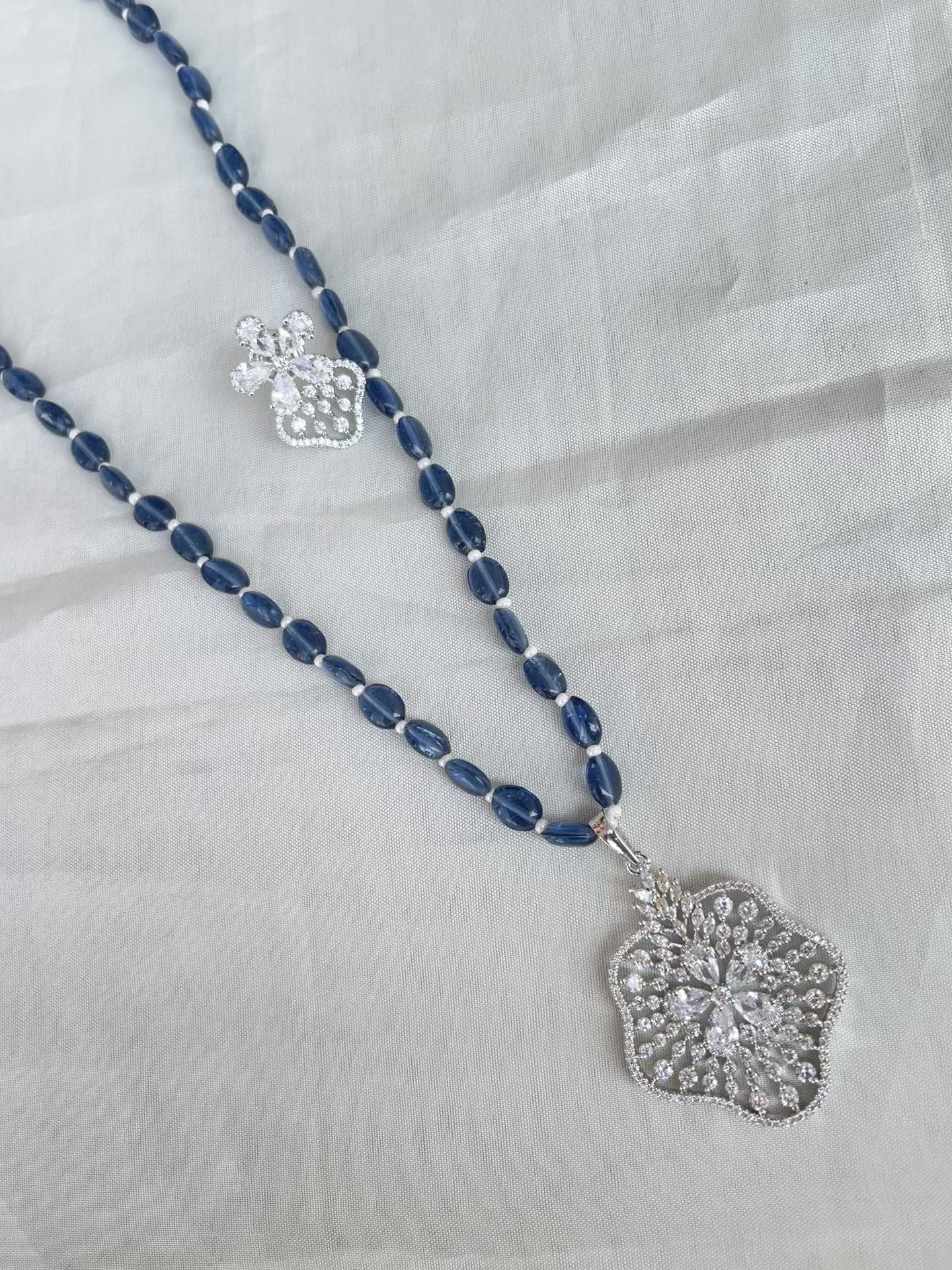 Beads with diamond finish pendent