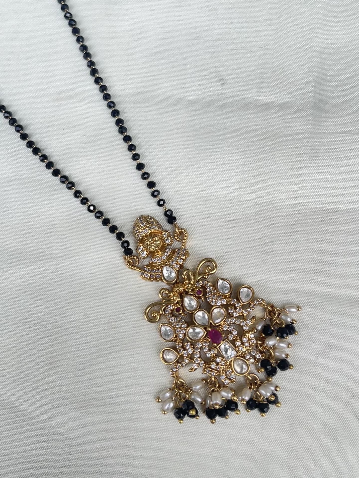 Single line blackbeads with Venkateswara swami pendant bb1720