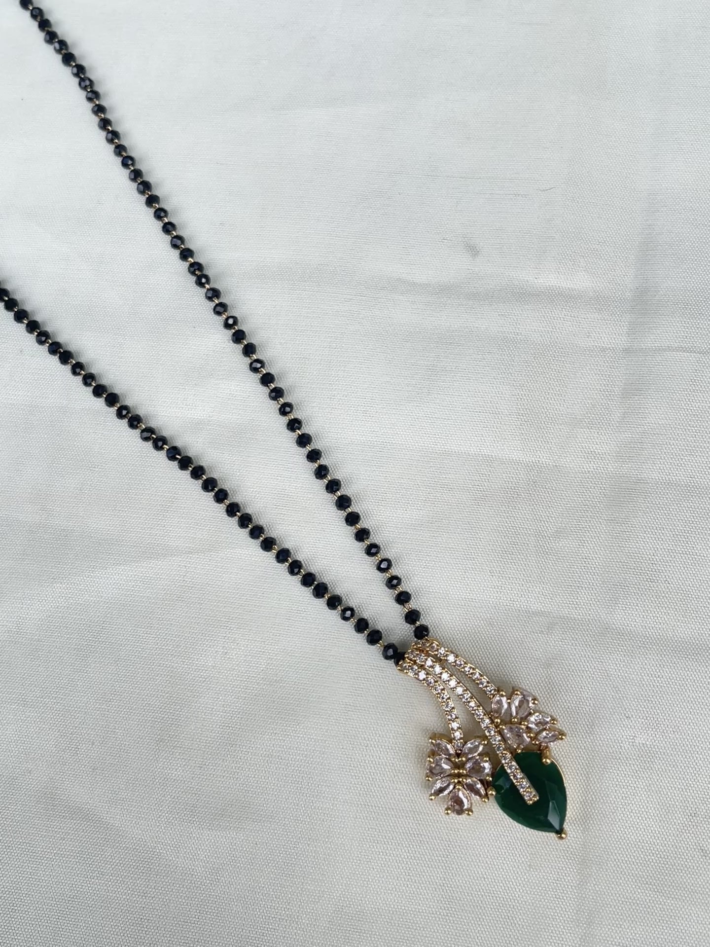 Single line blackbeads with green stone pendant bb1719