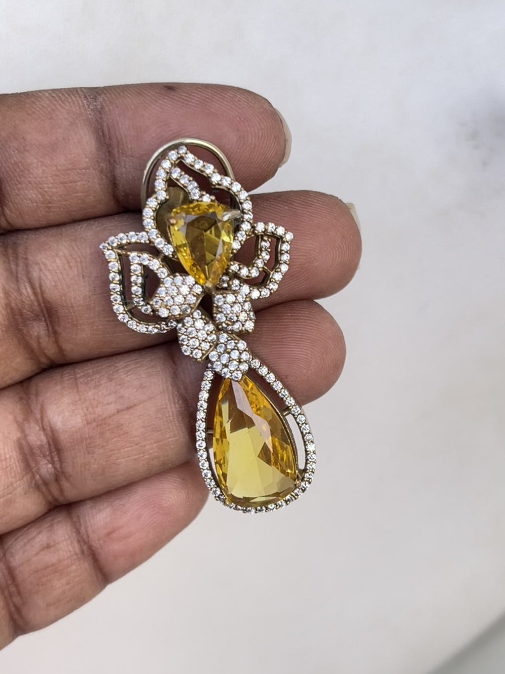 Western Diamond finish Earrings in Yellow stone
