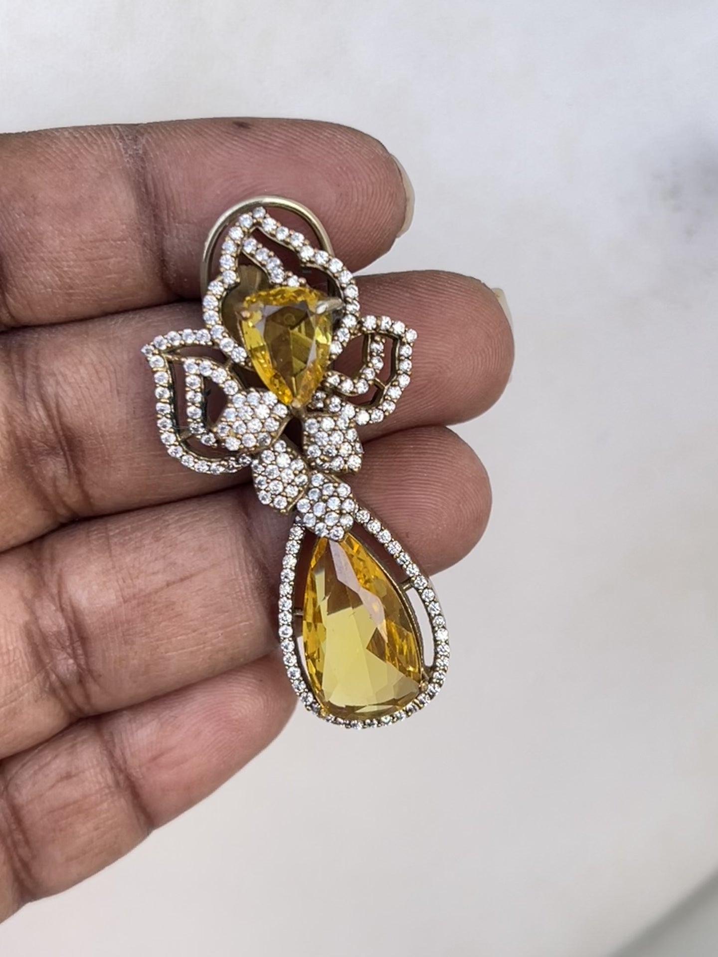 Western Diamond finish Earrings in Yellow stone