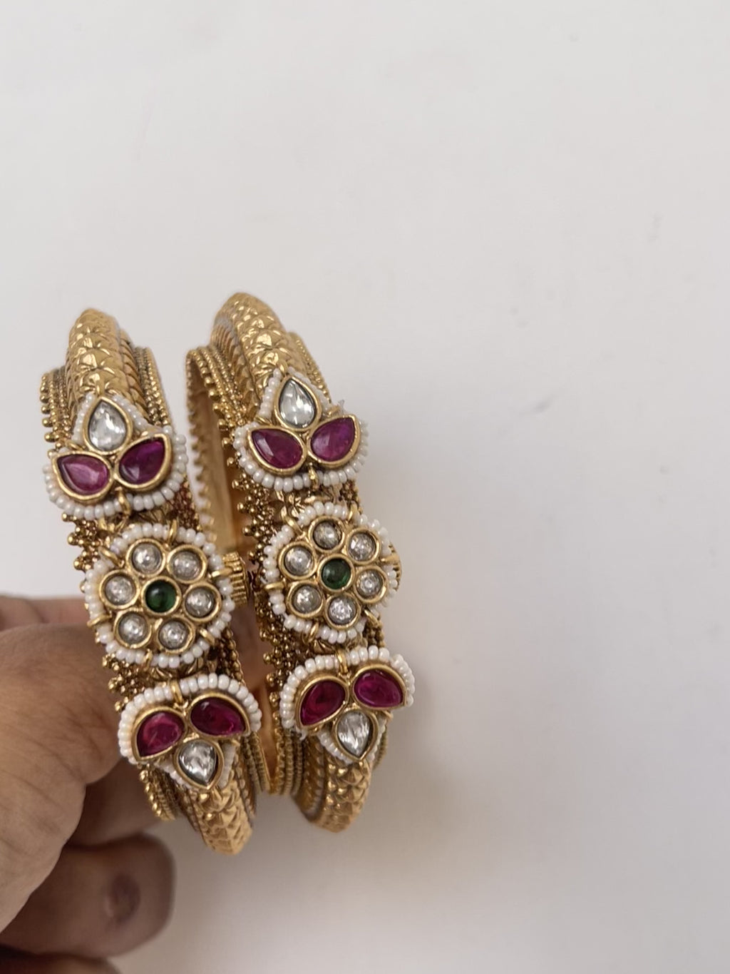 Pair of jadau kundan stone openable bangle