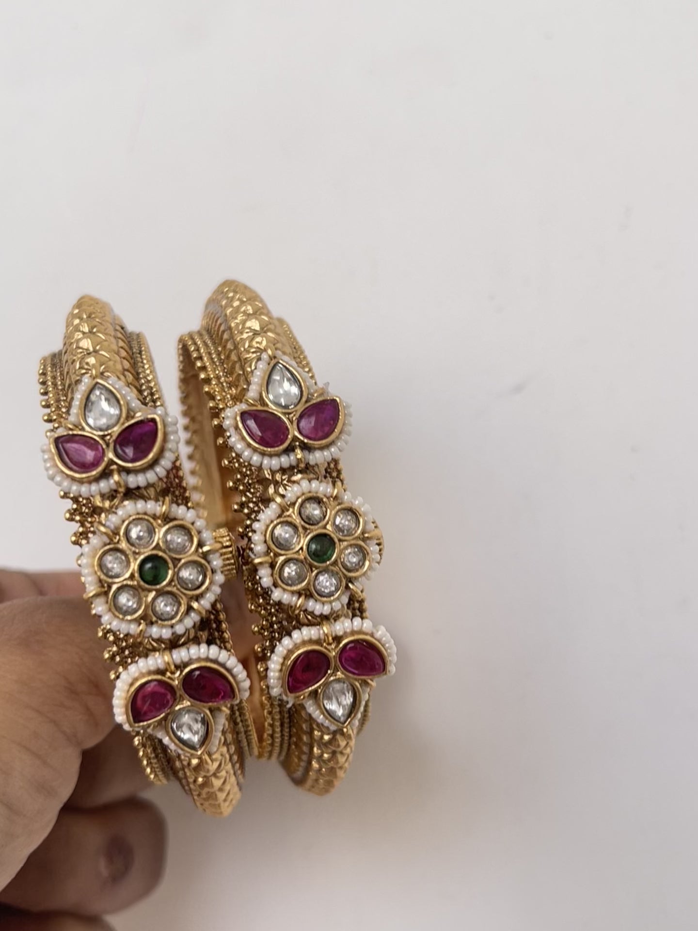 Pair of jadau kundan stone openable bangle